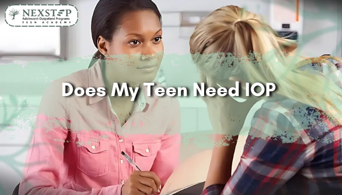 Therapist supports a distressed teen, symbolizing guidance for parents deciding if IOP is needed.